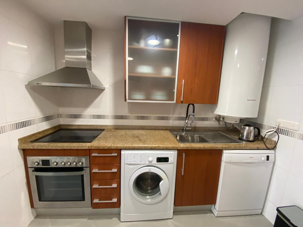 Elegant 2-Bedroom Apartment In Benidorm With Private Pool And Scenic Garden Views กาลา เด ฟีเนสตรัต ภายนอก รูปภาพ