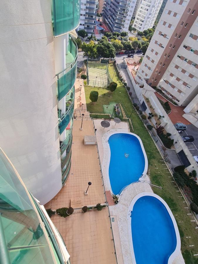 Elegant 2-Bedroom Apartment In Benidorm With Private Pool And Scenic Garden Views กาลา เด ฟีเนสตรัต ภายนอก รูปภาพ